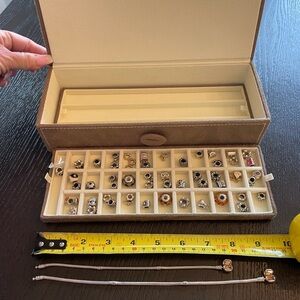 52 piece Authentic/ retired Pandora Silver and Gold Charms. Bracelets included!